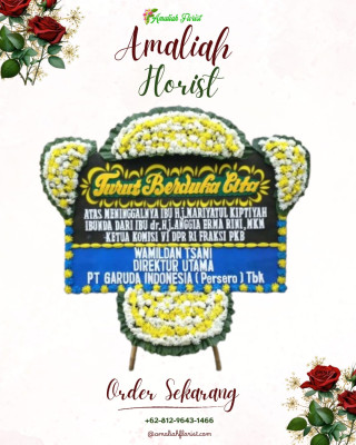 Papan Bunga Duka di Raya