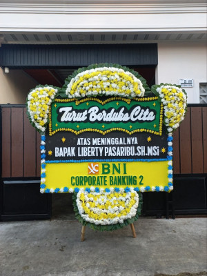 Papan Bunga Duka di Raya