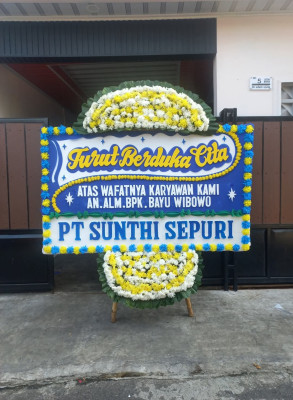 Papan Bunga Duka di Raya