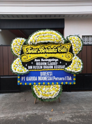 Papan Bunga Duka di Raya