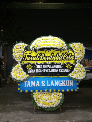 Papan Bunga Duka di Raya