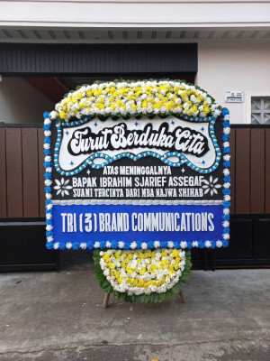 Papan Bunga Duka di Raya